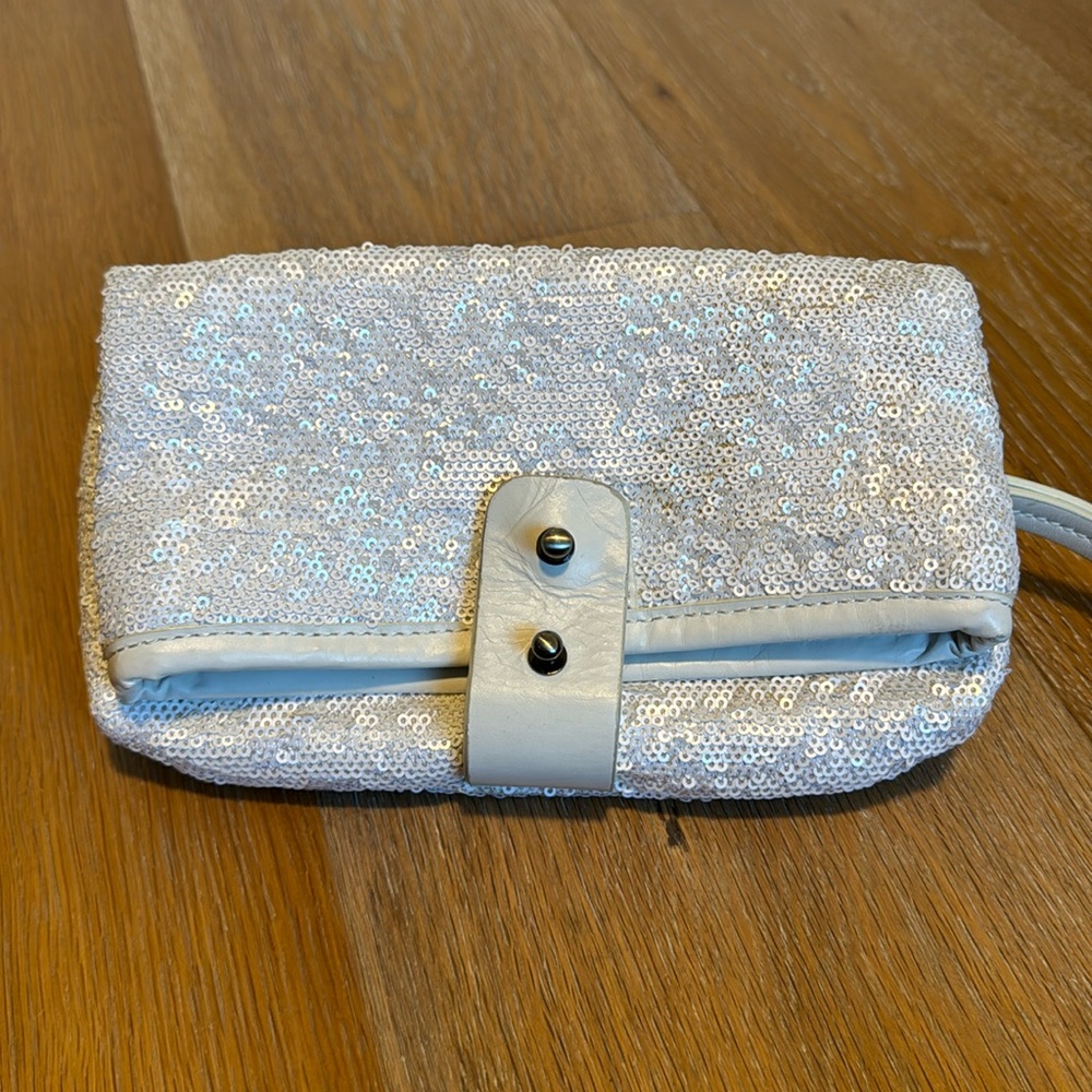 Max Azria white sequin and leather wristlet clutch